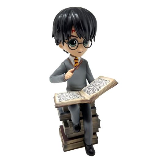 Harry Potter: Harry and the Pile of Spell Book Statue (21cm) Preorder